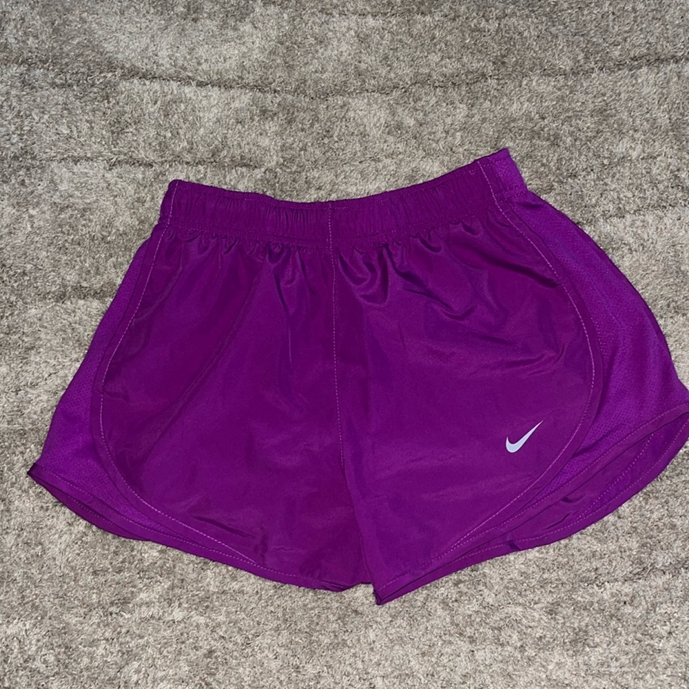 Bright purple Nike shorts
